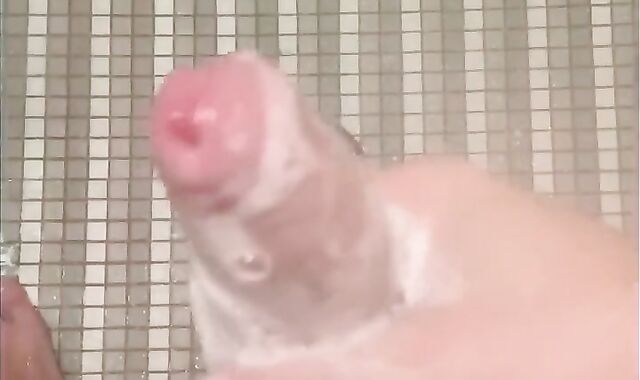 School Athlete Gets Muddy during Experience and Cleans up in the Douche