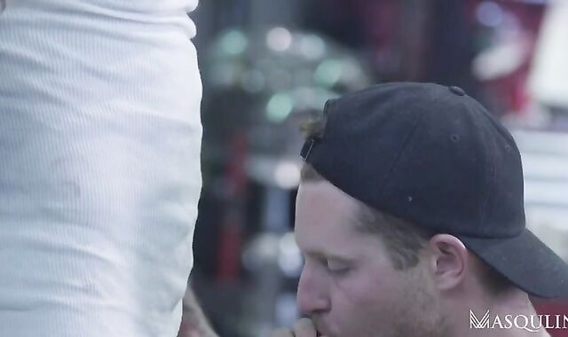 Van Mechanic boinks fellow At Workshop