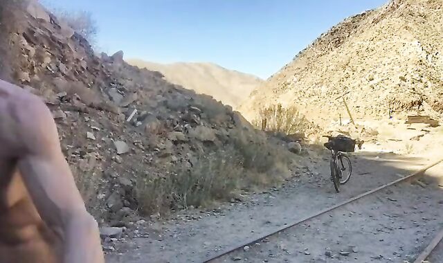 man Bicycle Rail In Nature's Clothing Un-edited