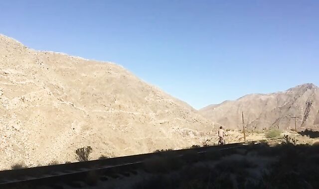 man Bicycle Rail In Nature's Clothing Un-edited