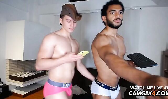 Bi-Racial pair massages Each Other And Uses Faux-Cocks On Their butts