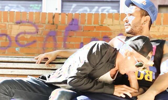 Latinos blowing And romping outdoors