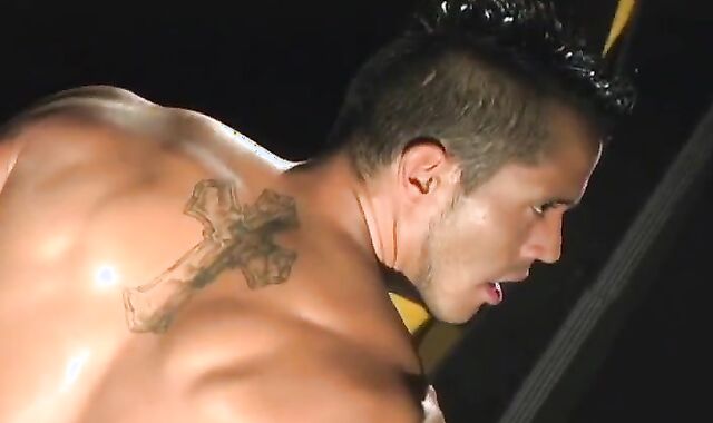 fleshy Brazilian chap In Leather Toying With A fuck stick