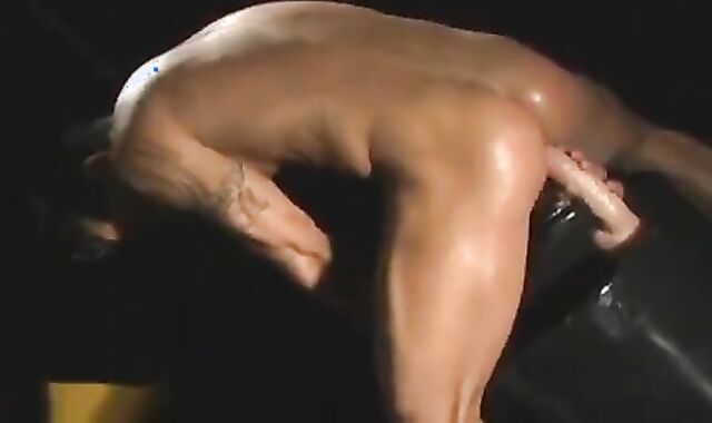 fleshy Brazilian chap In Leather Toying With A fuck stick