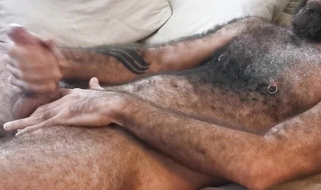 Ultra-Kinky fur covered bearded have fun with his spear