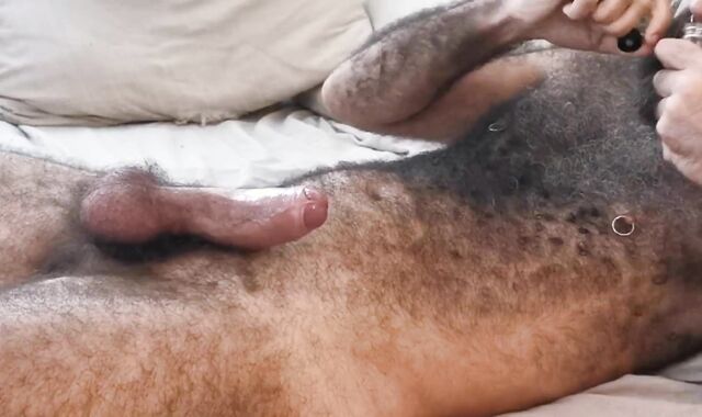 Ultra-Kinky fur covered bearded have fun with his spear