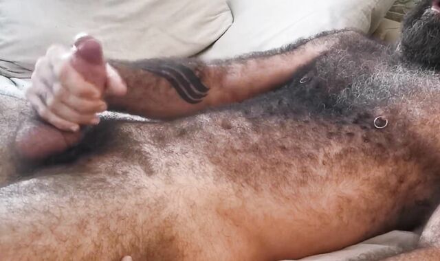 Ultra-Kinky fur covered bearded have fun with his spear
