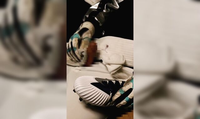 A baseball player with a nip morro sensing socks wanks with XXL football spikes