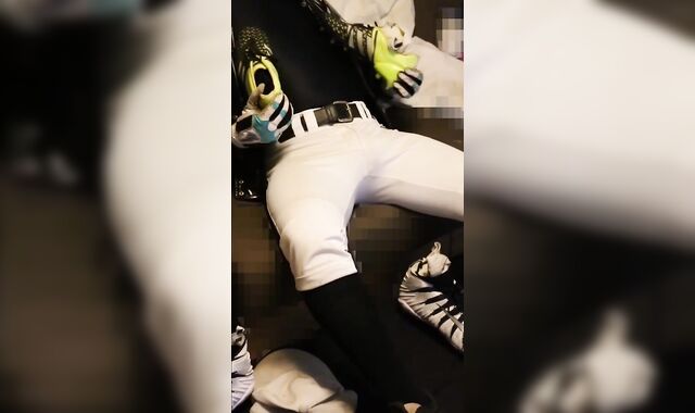 A baseball player with a nip morro sensing socks wanks with XXL football spikes