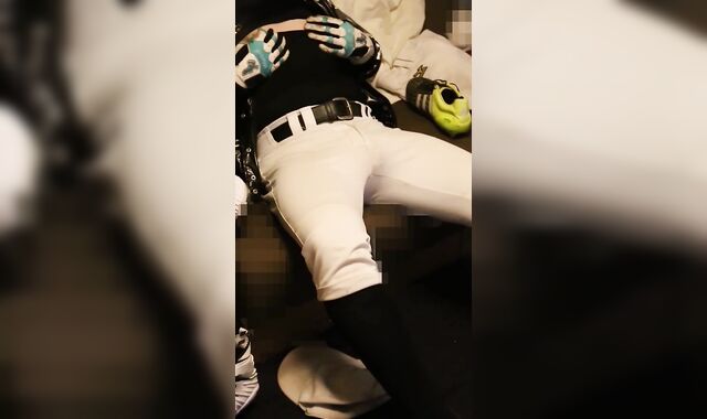 A baseball player with a nip morro sensing socks wanks with XXL football spikes