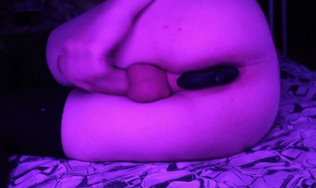 A fellow with a plaything in the backside jerks