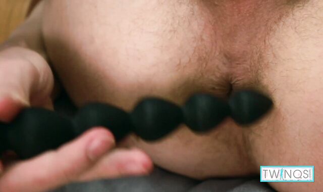 College-Aged Lucas Plays With a Toy While Stroking