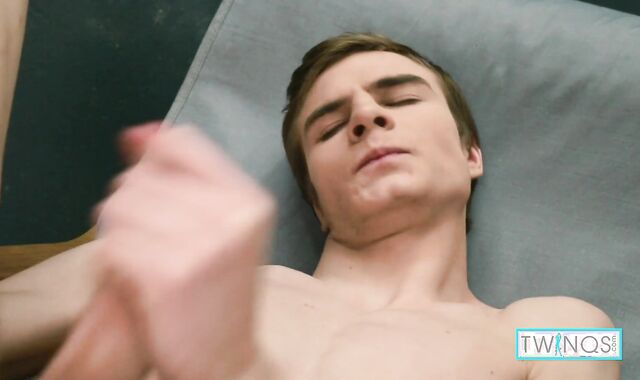 College-Aged Lucas Plays With a Toy While Stroking