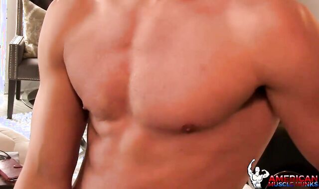 AmericanMuscleHunks: Gymnast Logan clad in uniform opening up