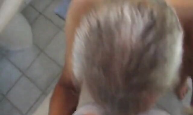 crosdresser having a blowjob by an old guy