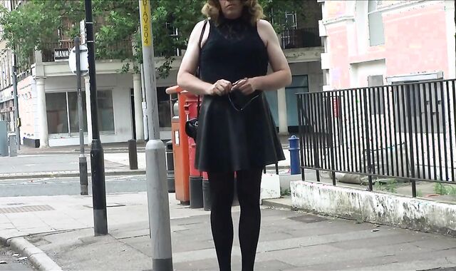 Sexy Transvestite masturbating out side the post office