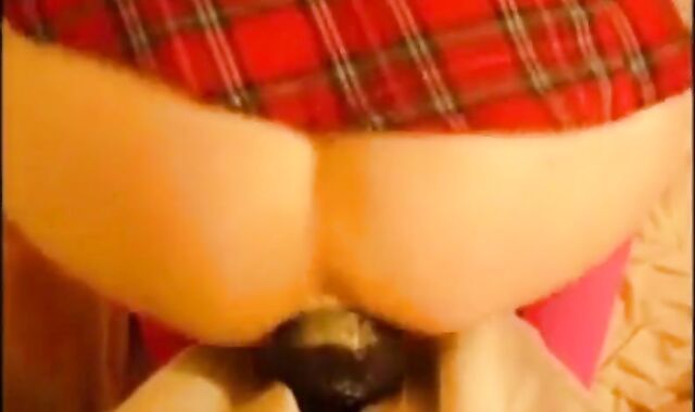 bitch in miniskirt and pink stockings riding her big dildo