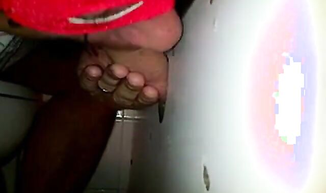 Glory hole cock sucking with cum swallow..