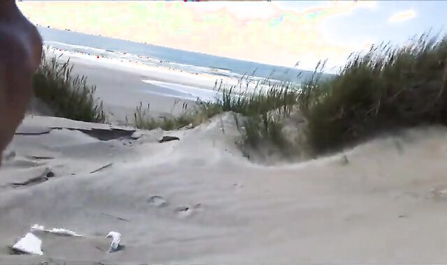 Exhibitionist Strokes Hard on the Beach