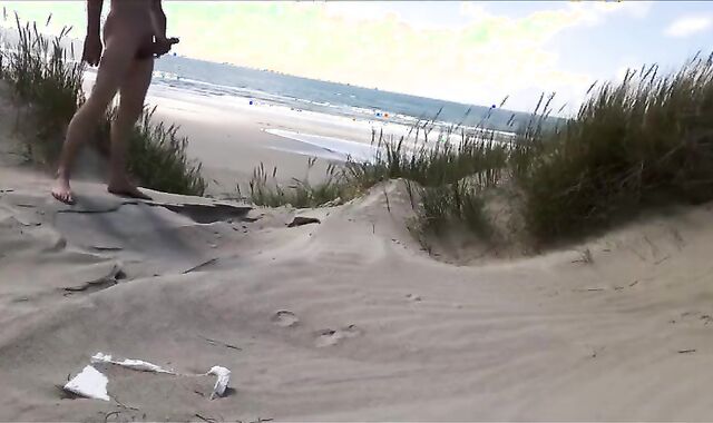 Exhibitionist Strokes Hard on the Beach