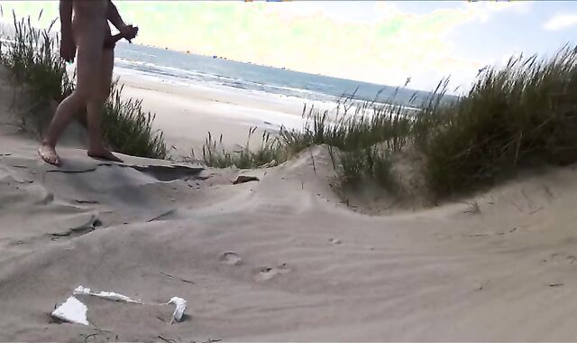 Exhibitionist Strokes Hard on the Beach