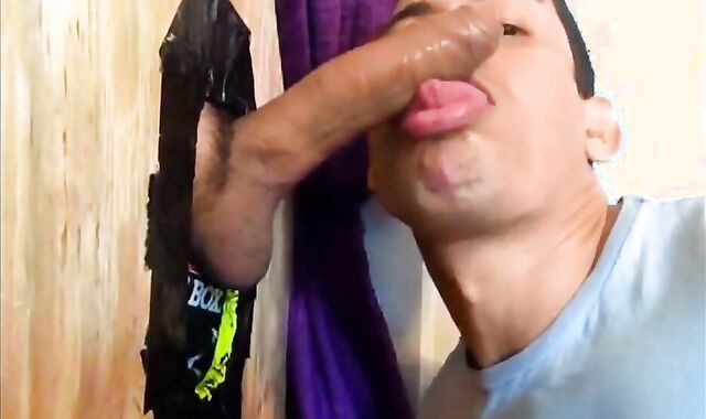 Glory Hole Amateur Takes on Big Cocks