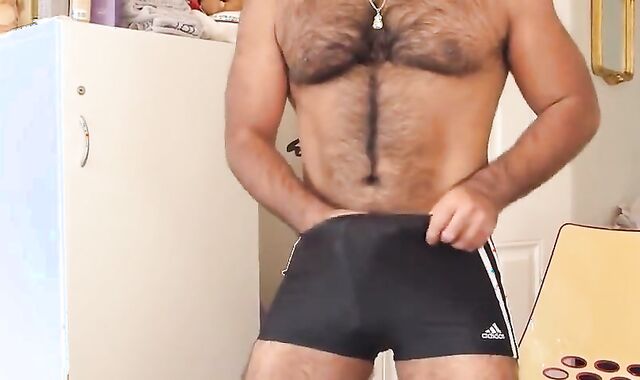 Hairy Asian Guy Strokes His Big Cock