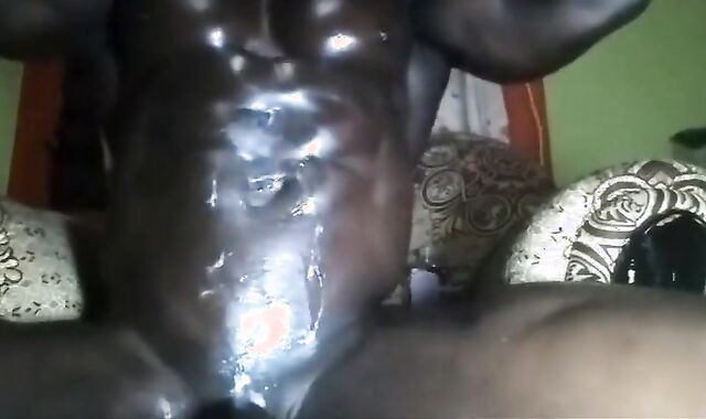 Muscular Black Bodybuilder Flexes and Strokes on Webcam