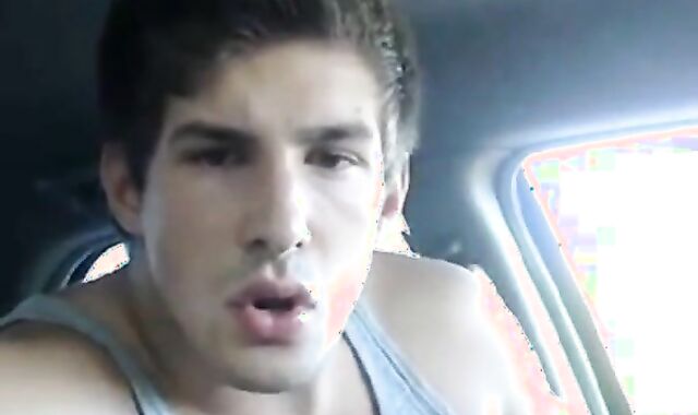 Big-cock jock strokes in his car