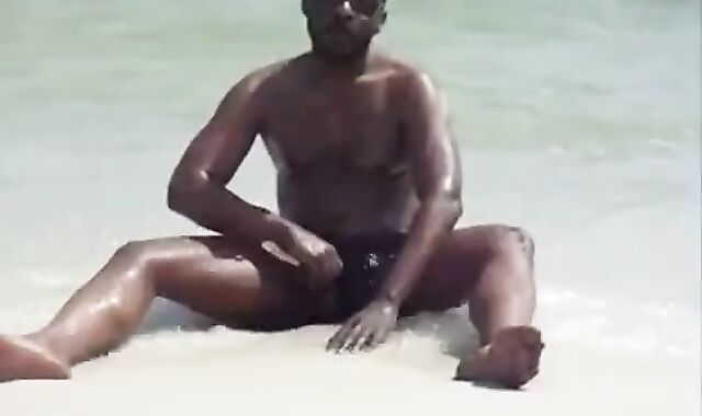 Black Amateur Strokes His Big Cock Outdoors at the Beach