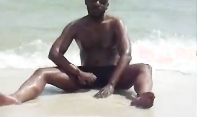 Black Amateur Strokes His Big Cock Outdoors at the Beach