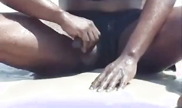 Black Amateur Strokes His Big Cock Outdoors at the Beach