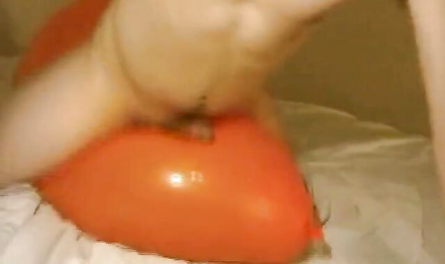 Twink Humping and Cumming on an Inflatable Orange Balloon
