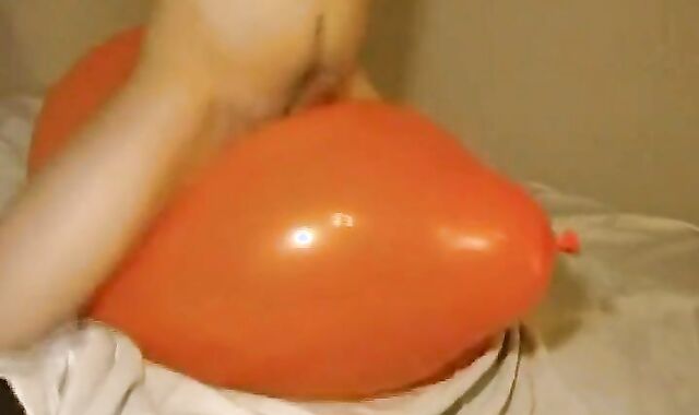 Twink Humping and Cumming on an Inflatable Orange Balloon