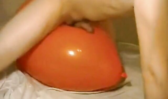 Twink Humping and Cumming on an Inflatable Orange Balloon