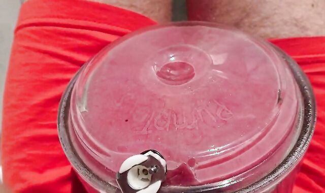 Giant balls pumping hunk outdoors