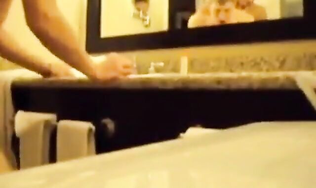 Interracial Couple's Bareback Bathroom Fuck 2