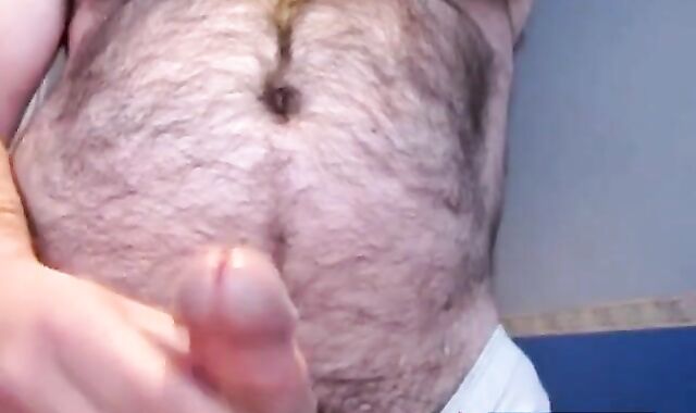 Hairy Bear Strokes His Big Dick