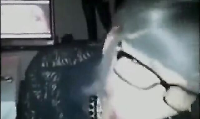 Crossdressing Secretary Gives Amateur Blowjob on Webcam