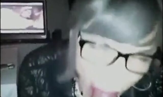 Crossdressing Secretary Gives Amateur Blowjob on Webcam