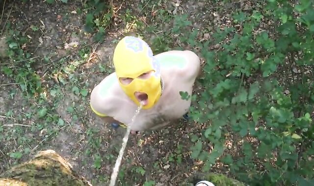 Pissing Master Uses Slave Outdoors for Pleasure