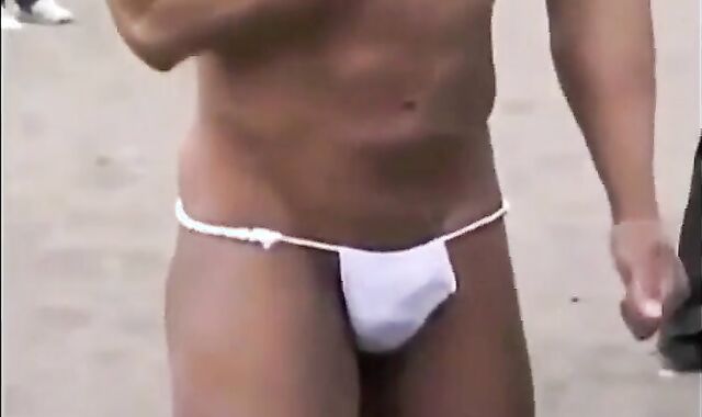 Muscled Asian Stud Bares Almost All at the Beach