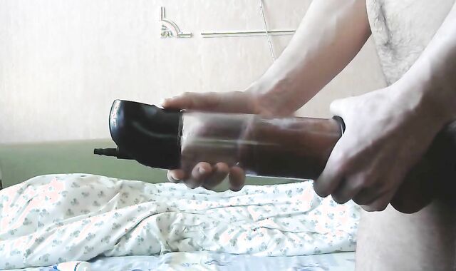 Vacuum Pumping a Big Cock on Webcam