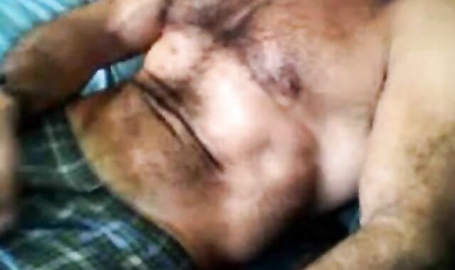 Bearded daddy strokes his cock solo