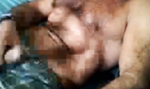 Bearded daddy strokes his cock solo