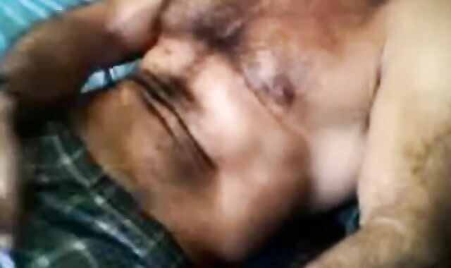 Bearded daddy strokes his cock solo