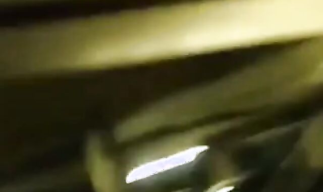 Big-Cocked Man Strokes in Car While Watching Porn