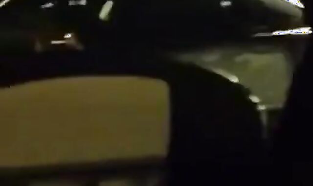 Big-Cocked Man Strokes in Car While Watching Porn