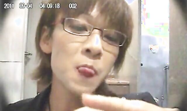 Asian Crossdresser Masturbates in a Public Bathroom