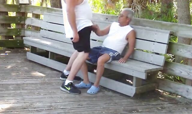Daddies Have Outdoor Fun in Public Park